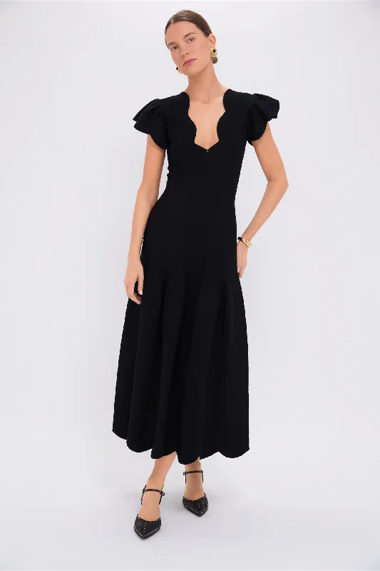 Midi dresses with ruffled bodices for a more pronounced feminine look Noir Yvette Dress