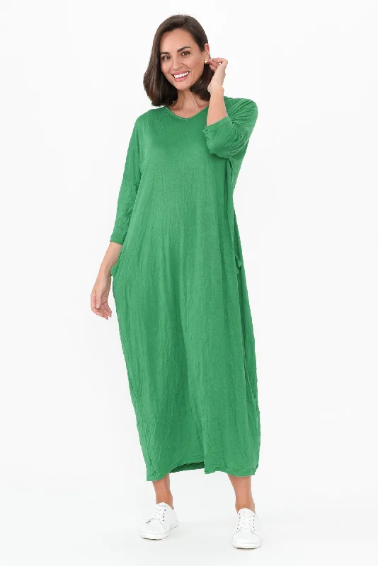 Midi dresses with tiered skirts for a bohemian festival look Travel Green Crinkle Cotton Sleeved Maxi Dress