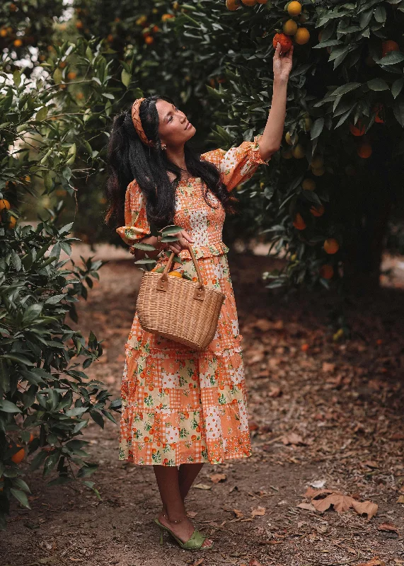 Midi dresses with ribbed textures for a unique and tactile appearance Orange Blossom Dress Midi dresses with ribbed textures for a unique and tactile appearance Orange Blossom Dress
