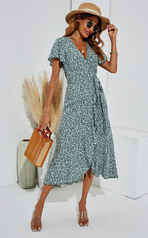 Midi dresses with empire waists for a flattering maternity option Grünes Midikleid mit Blumendruck und Wickelsaum Midi dresses with empire waists for a flattering maternity option Grünes Midikleid mit Blumendruck und Wickelsaum