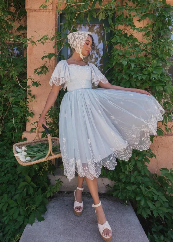 Midi dresses with belted waists to accentuate the figure Seraphina Dress
