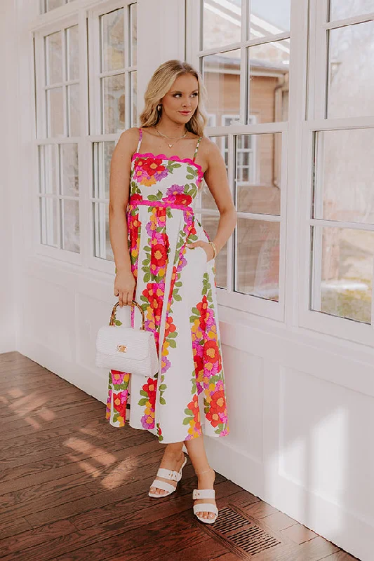 Midi dresses with pleated skirts for a timeless and elegant appeal Cabo Cantina Floral Midi Dress