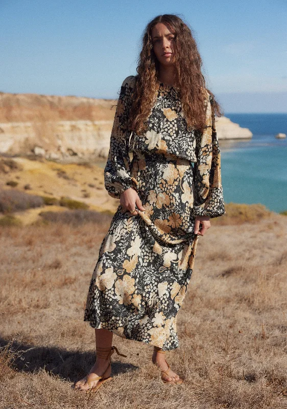 Midi dresses with gathered skirts for a full and flowing silhouette Sorrel Midi Dress Midi dresses with gathered skirts for a full and flowing silhouette Sorrel Midi Dress