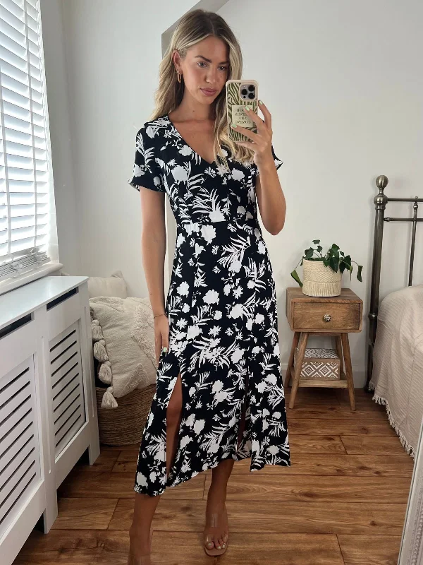 Maxi - inspired midi dresses with flowing fabrics for a beachy vibe Winnie V Neck Midi Dress / Mono Floral Maxi - inspired midi dresses with flowing fabrics for a beachy vibe Winnie V Neck Midi Dress / Mono Floral