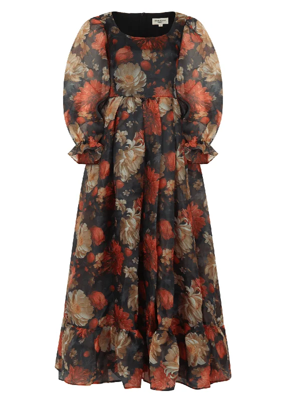 Midi dresses with geometric cutouts for a contemporary and edgy look Sable Dress
