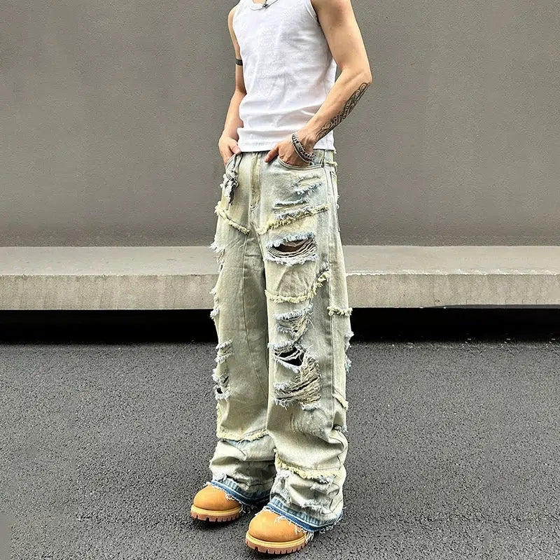 Ripped women jeans for a rebellious and fashion - forward styleBaggy Jeans with Multi-Tier Rips Ripped women jeans for a rebellious and fashion - forward styleBaggy Jeans with Multi-Tier Rips