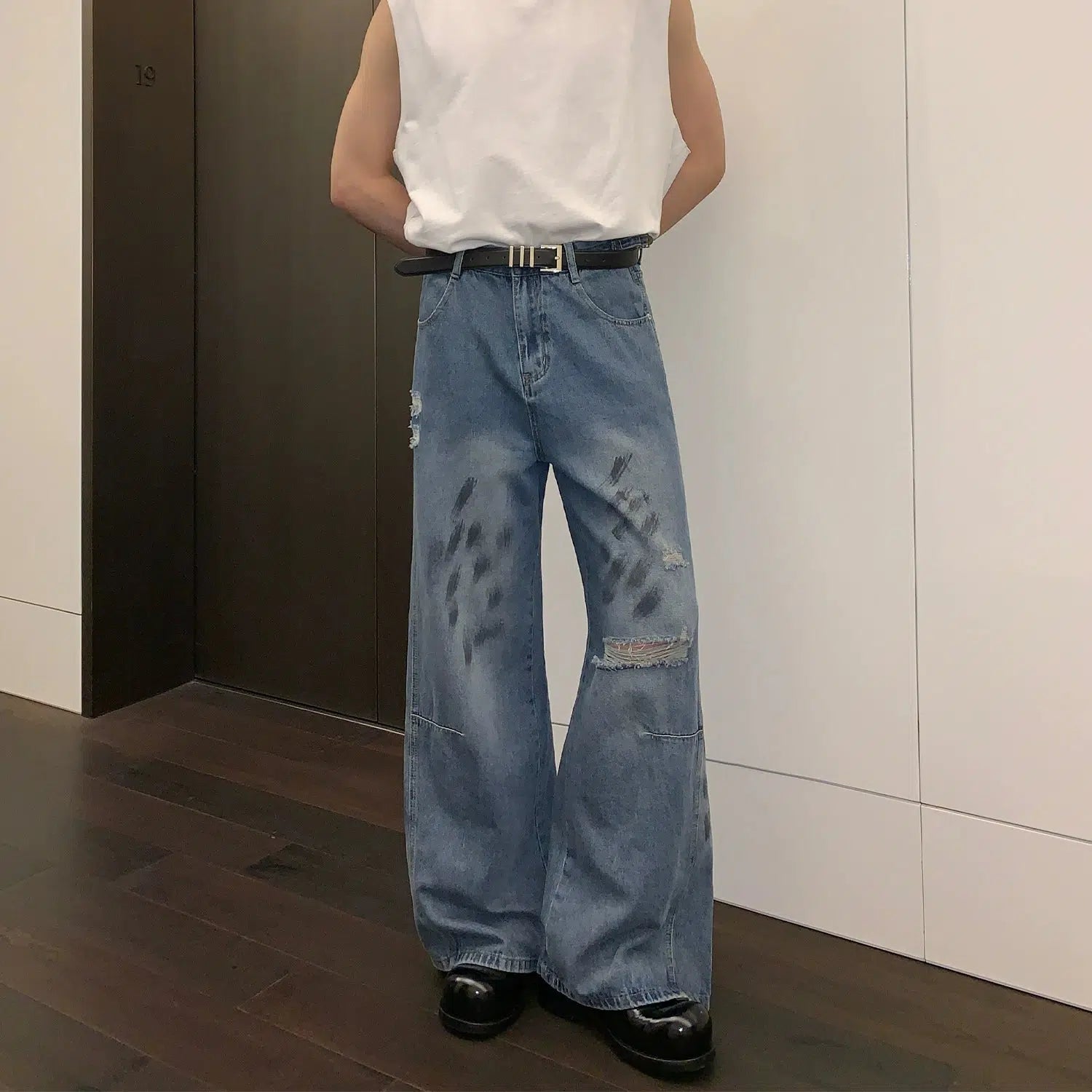 High - rise flare women jeans for a 70s - inspired lookDirty Print Ripped Jeans