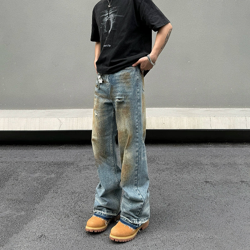 Ripped women jeans for a rebellious and fashion - forward styleDistressed Dirty Ripped Jeans