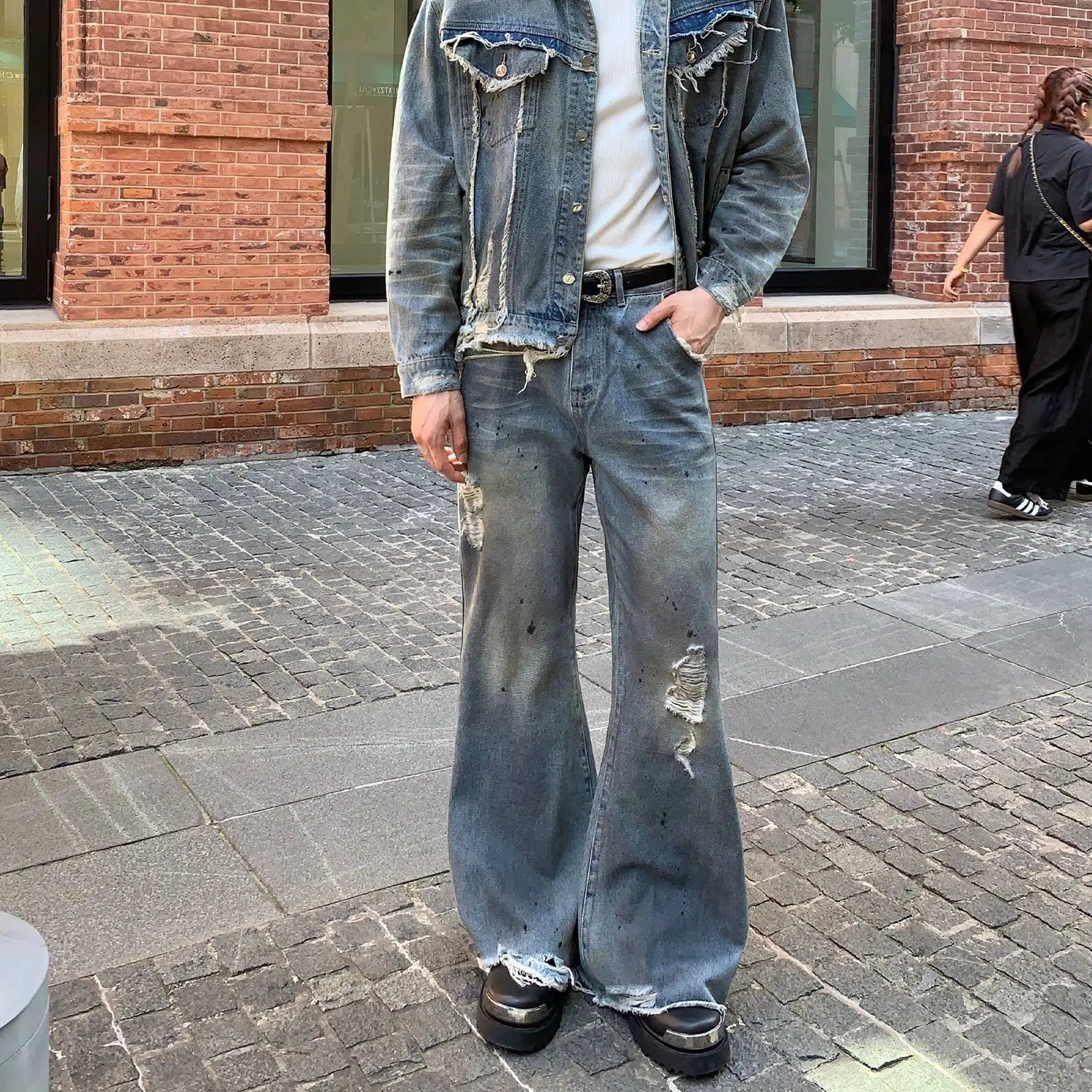 Embellished women jeans with studs or rhinestones for a glamorous touchDistressed Wide-Leg Jeans with Raw Hem
