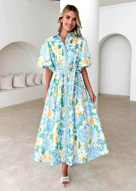 Midi dresses with geometric cutouts for a contemporary and edgy lookCeres Midi Dress - Blue Hydrangea Midi dresses with geometric cutouts for a contemporary and edgy lookCeres Midi Dress - Blue Hydrangea