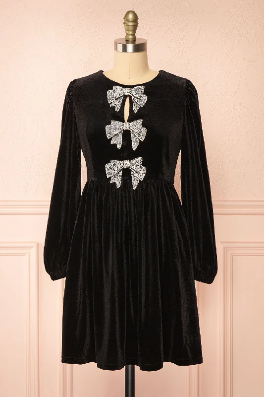 Midi dresses with animal prints for a bold and confident appearanceDazzlina | Black Velvet Dress w/ Bows