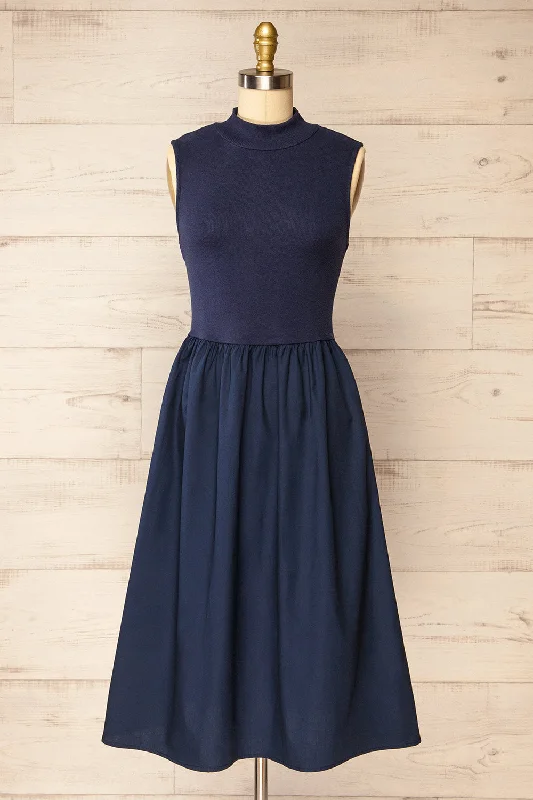 Midi dresses with tiered skirts for a bohemian festival lookFrell Navy | Midi Dress w/ Mock Neck Midi dresses with tiered skirts for a bohemian festival lookFrell Navy | Midi Dress w/ Mock Neck