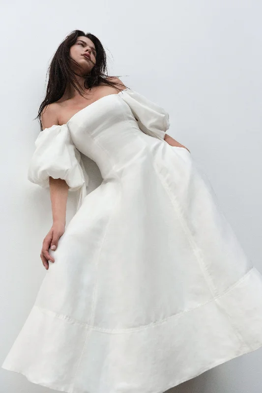 Midi dresses with bow accents for a sweet and charming lookIncarnation Midi Dress