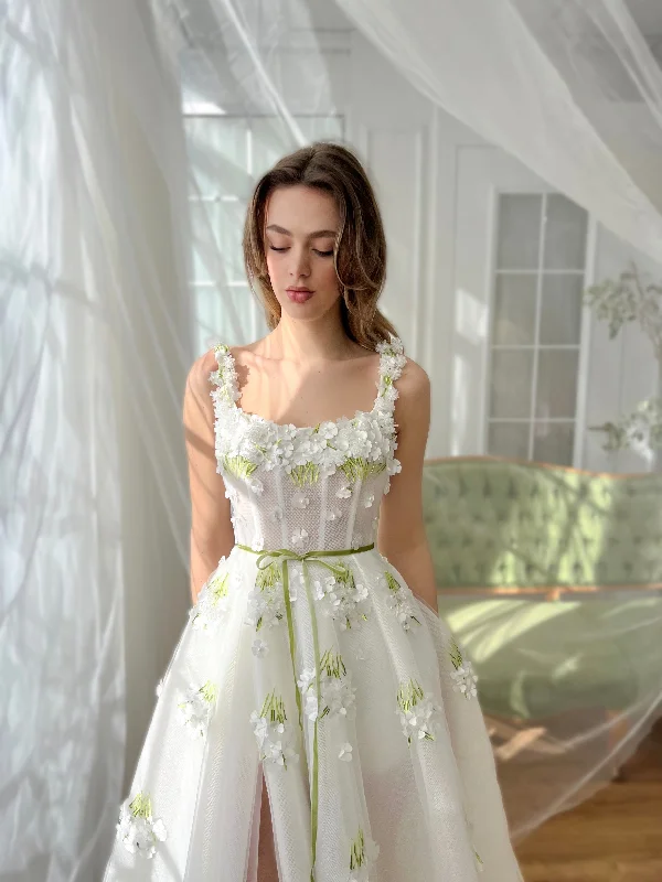 Midi dresses with pleated bodices for a classic and tailored lookIvory Botanica Gown