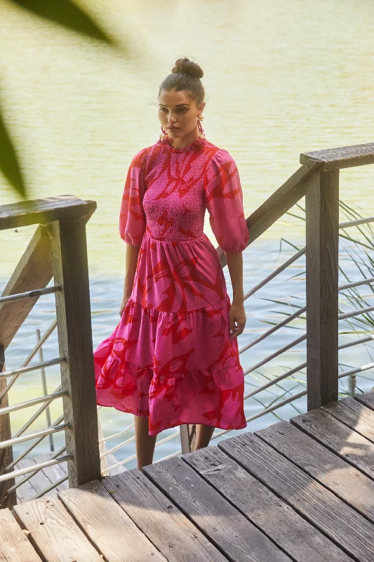 Midi dresses with ruffled sleeves for a more feminine and voluminous lookJolene Abstract Frazier Smocked Tiered Midi Dress