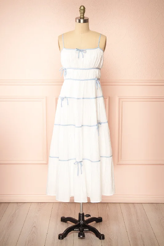 Midi dresses with tiered skirts for a bohemian festival lookJuliriel | White Midi Dress w/ Blue Ribbons