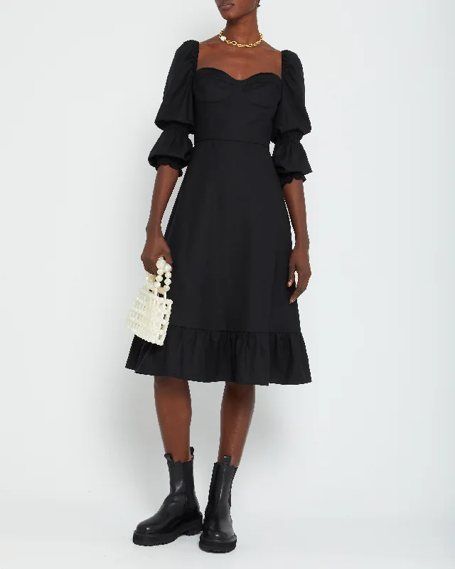 Midi dresses with animal prints for a bold and confident appearanceKourtney Dress