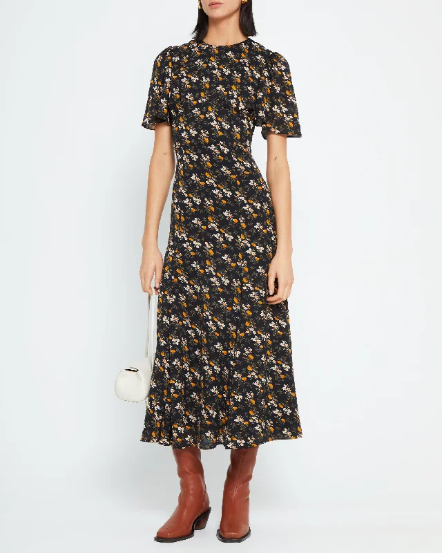High - low midi dresses with geometric patterns for a modern partyRiz Dress