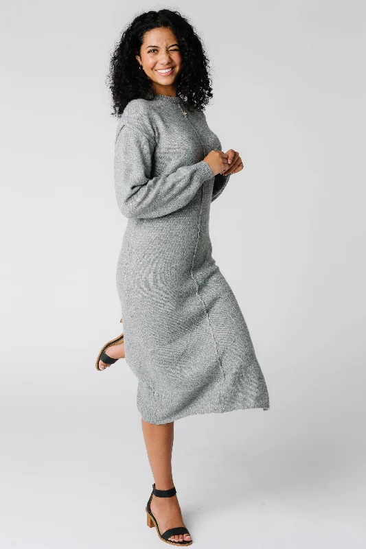 Midi dresses with pom - pom trims for a playful and festive lookSundance Sweater Dress