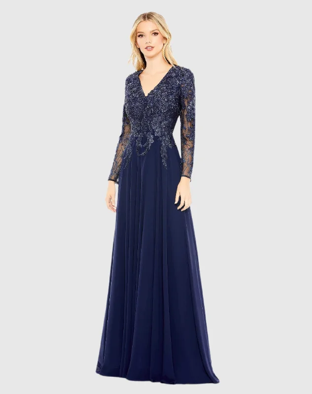 Metallic maxi dresses for a glamorous New Year's Eve partyBlue Embellished Illusion V Neck Long Sleeve Gown