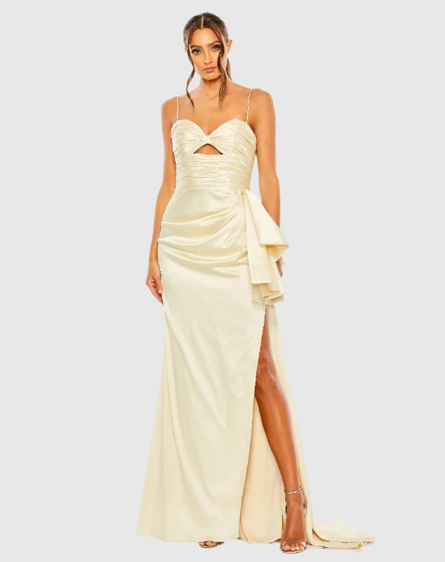 Maxi dresses with a pleated skirt for a timeless and elegant appearanceBeige Spaghetti Strap Cut Out Side Bow Gown Maxi dresses with a pleated skirt for a timeless and elegant appearanceBeige Spaghetti Strap Cut Out Side Bow Gown