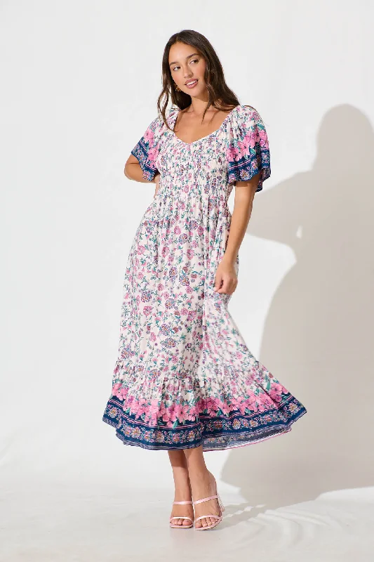 Printed maxi dresses with abstract patterns for an artistic lookCarmella Maxi Dress in Pink and Blue Floral