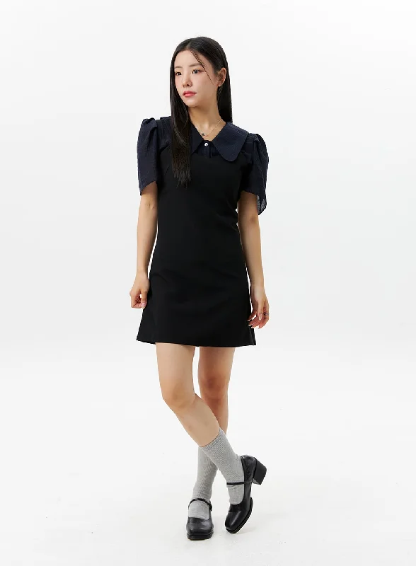 Mini dresses with asymmetric hems for a fashion - forward lookA-Line Mini Dress OL331