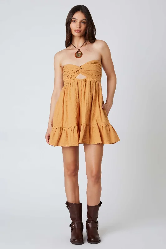 Strapless mini dresses for a beach vacationArgie Mustard Strapless Romper