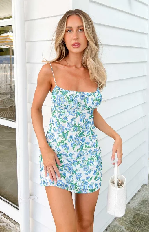 Mini dresses with side slits for a sexy appealIsabel White Floral Mini Dress