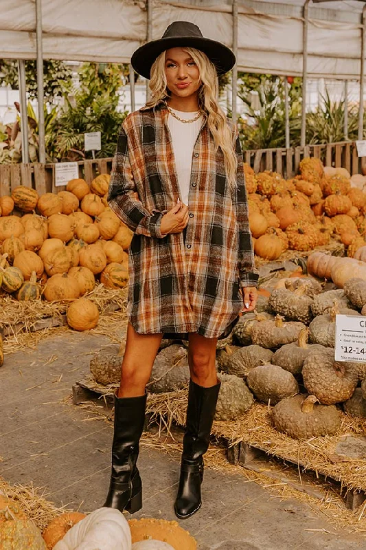 Mini dresses with bow accents for a sweet lookPeppermint Kisses Flannel Tunic Dress In Black