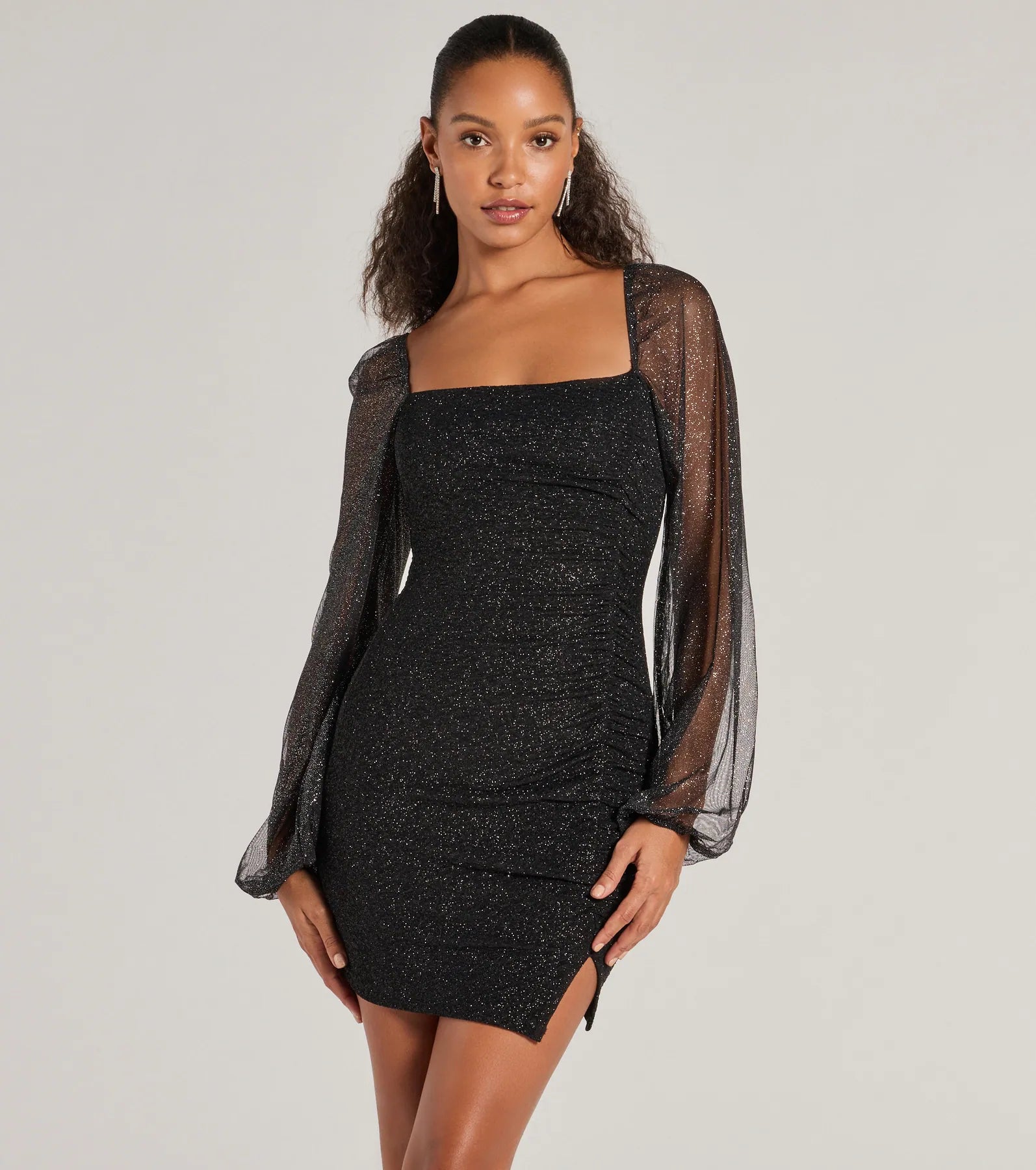 Mini dresses with abstract prints for an artistic lookShimmer Season Long Sleeve Glitter Mini Dress
