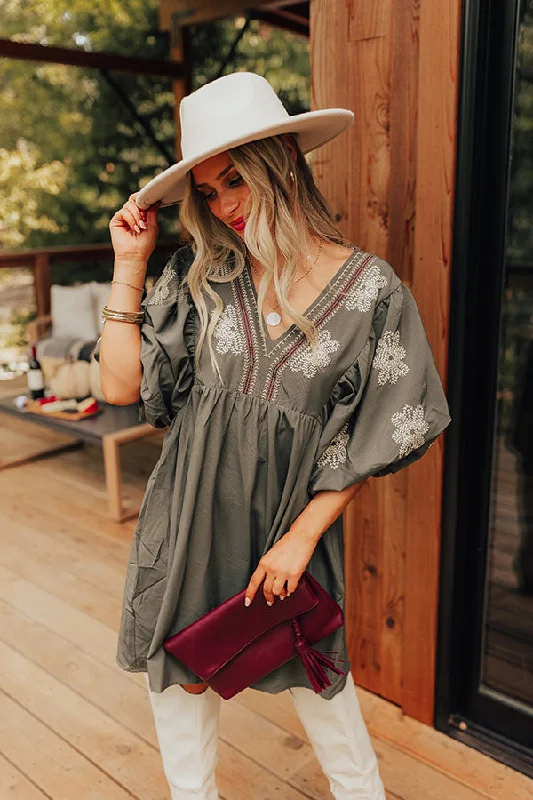 Mini dresses with abstract prints for an artistic lookTucson Sunsets Embroidered Mini Dress in Sage