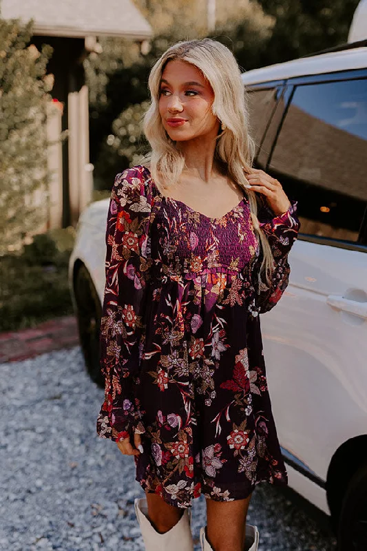 Mini dresses with cut - out details for a trendy lookVino Sippin' Floral Mini Dress
