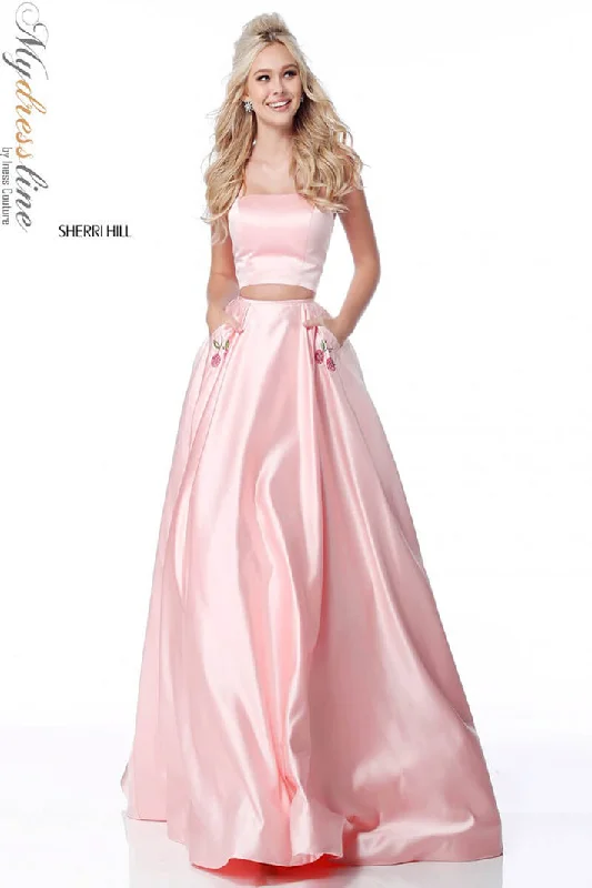 Prom dresses with geometric - cutout sleeves and flowing chiffon fabrics for a modern and airy lookSherri Hill 51813 Prom dresses with geometric - cutout sleeves and flowing chiffon fabrics for a modern and airy lookSherri Hill 51813