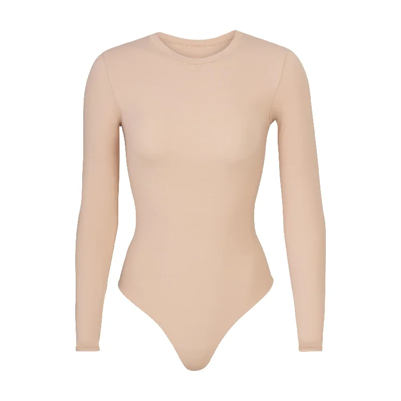 Mesh Bodysuits for a Bold and Edgy Fashion StatementFITS EVERYBODY LONG SLEEVE CREW NECK BODYSUIT | MICA