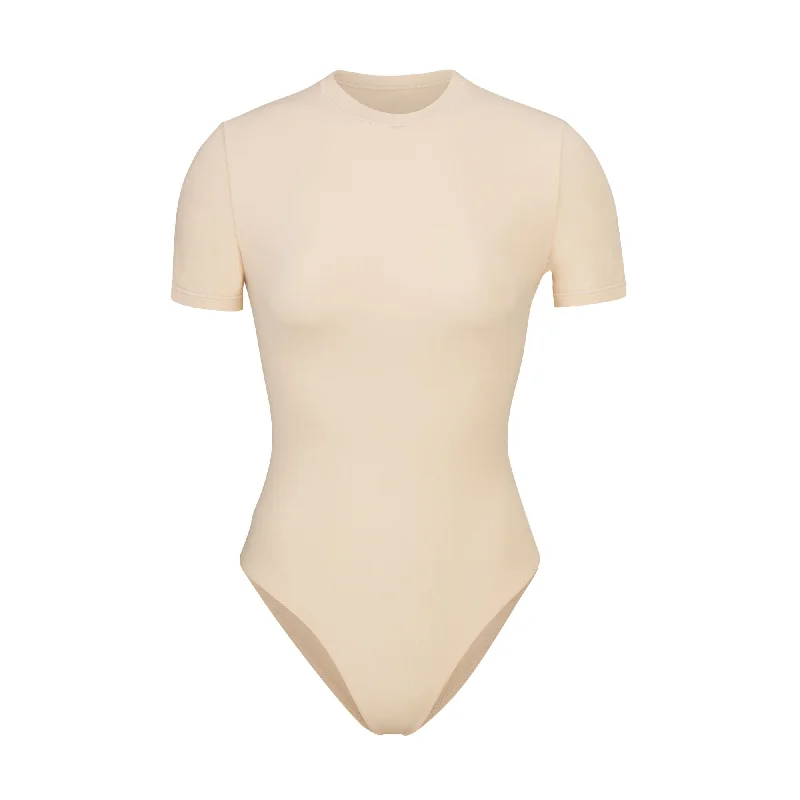 Sheer Bodysuits for a Seductive and Alluring OutfitFITS EVERYBODY T-SHIRT BODYSUIT | SAND