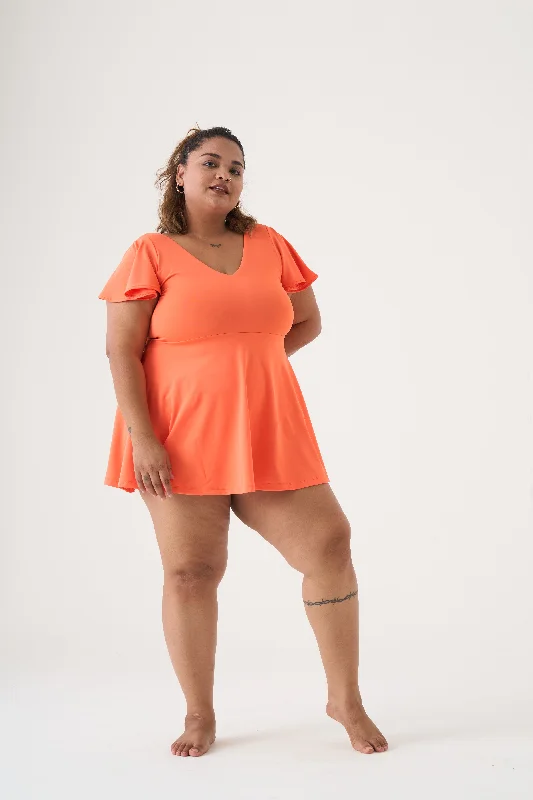Plus size swimwear with polka dots for playful looksFlutter Swim Dress: Orange