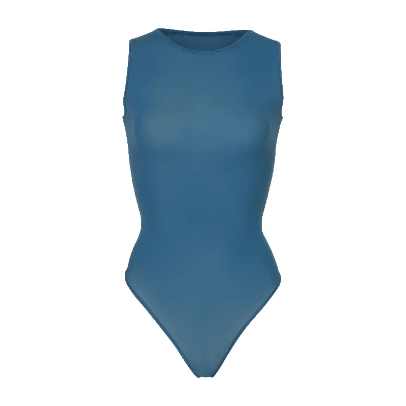 Ruffled Bodysuits with a Playful and Feminine TouchJELLY SHEER CREW NECK BODYSUIT | OCEAN Ruffled Bodysuits with a Playful and Feminine TouchJELLY SHEER CREW NECK BODYSUIT | OCEAN